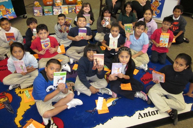 Reading Is Fundamental: Students with their new books. rif